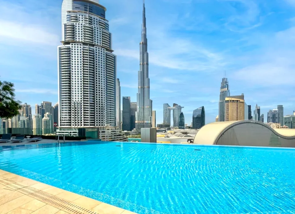 Shared swimming pool at Boulevard Point with the Downtown skyline beyond