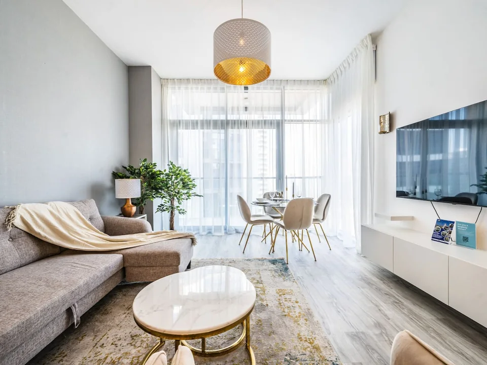 Bright living and dining room at Bellevue Towers