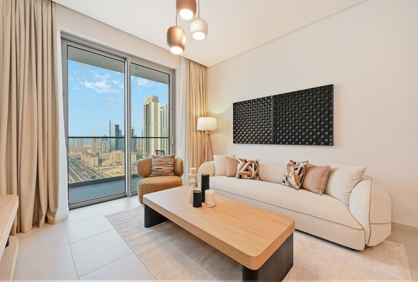Cream furnishings and skyline views in a WiseStay managed home